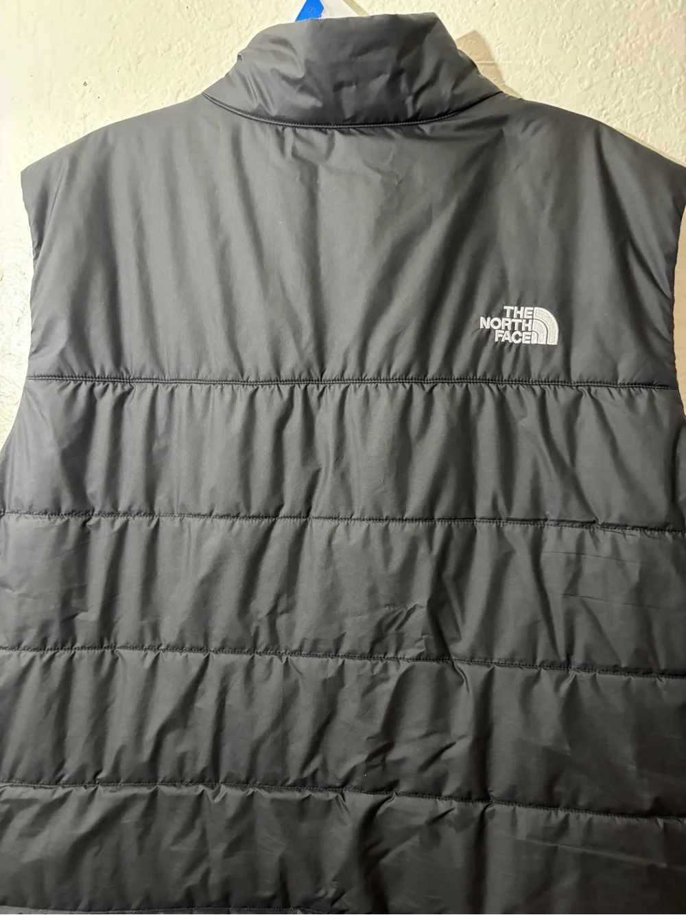 The North Face Black Quilted Puffer Vest with Safelite Logo